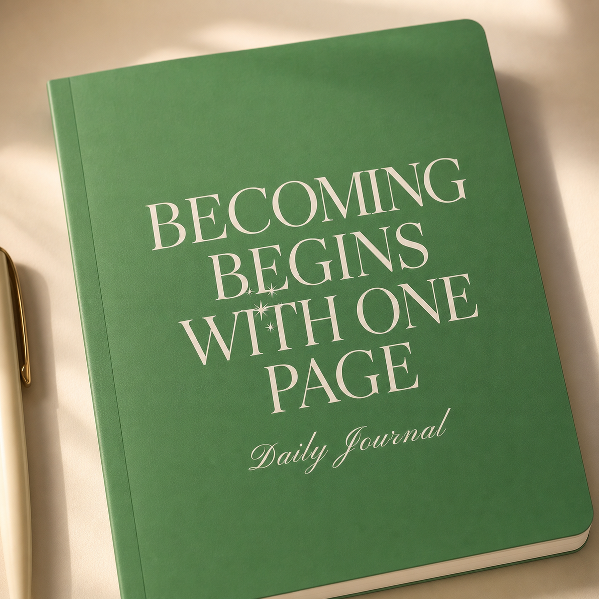 Close-up of the green journal satin cover, rounded corner, and cream typography
