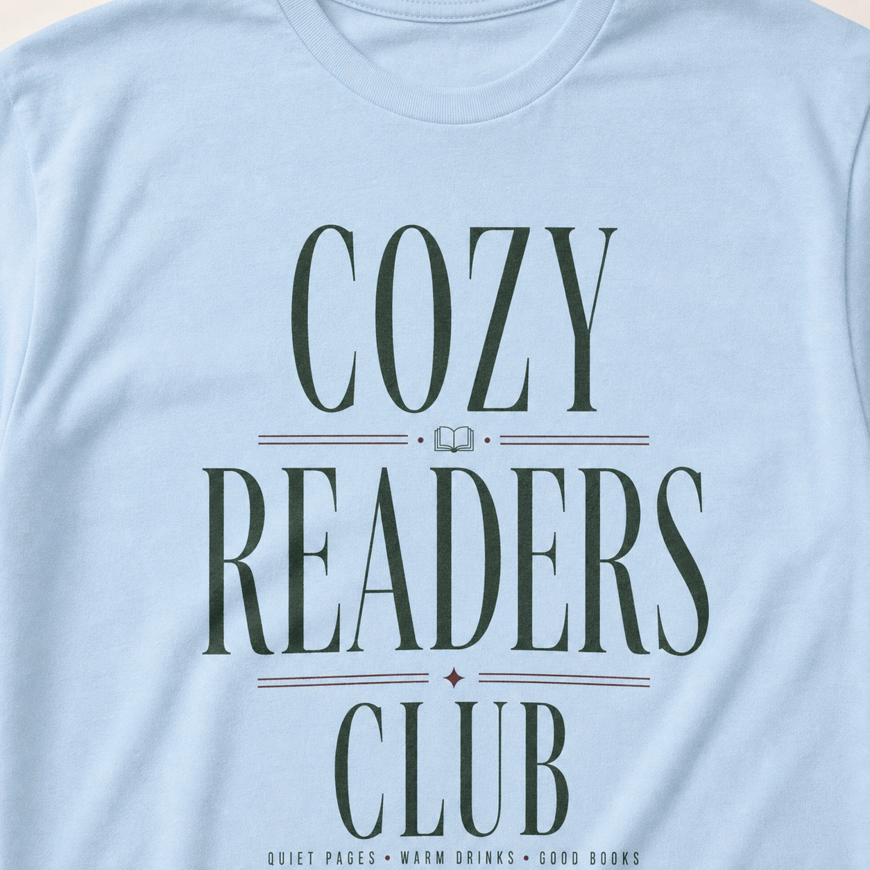 Light Blue Cozy Readers Club tee print and cotton texture close-up