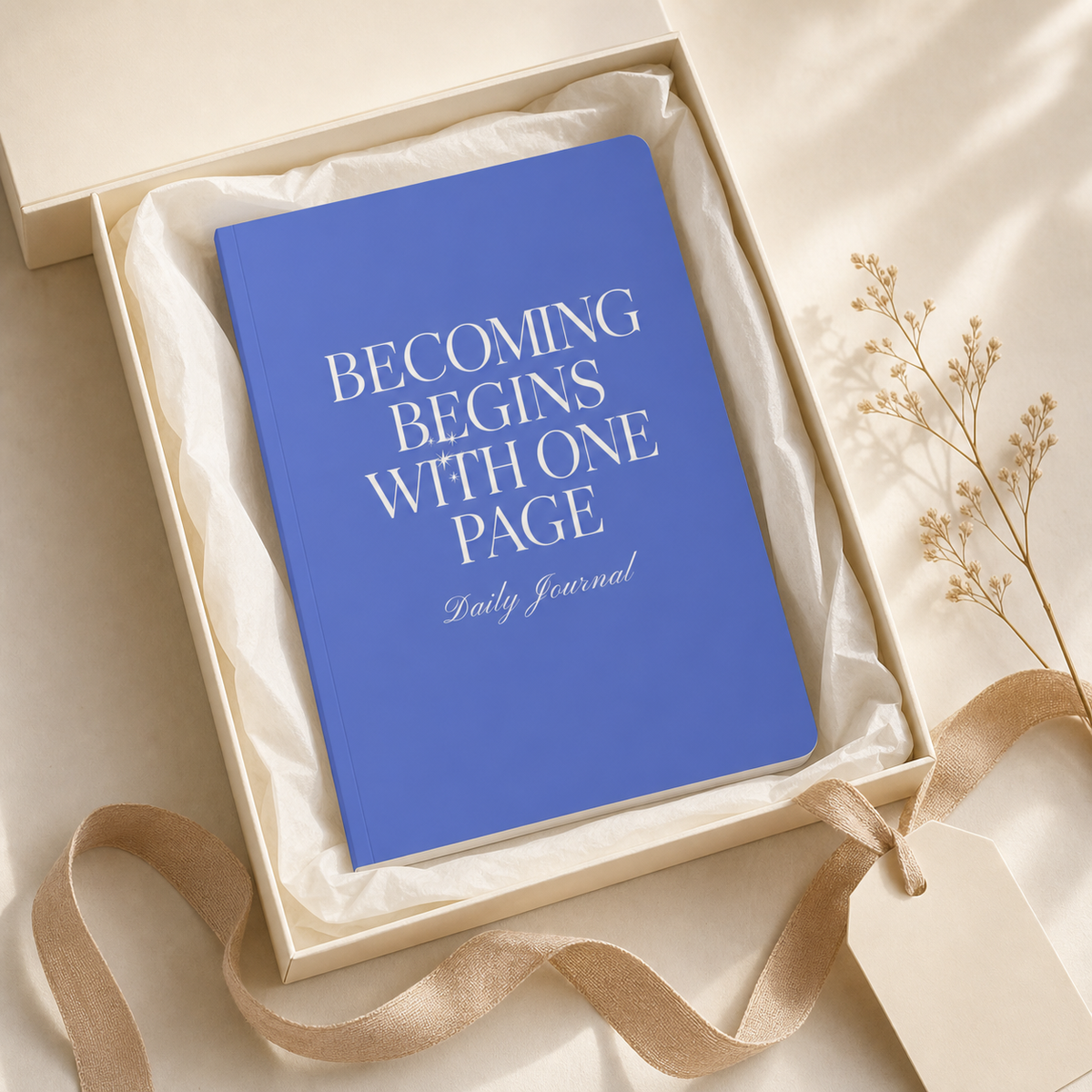 Blue Becoming Begins with One Page journal presented in a cream gift box