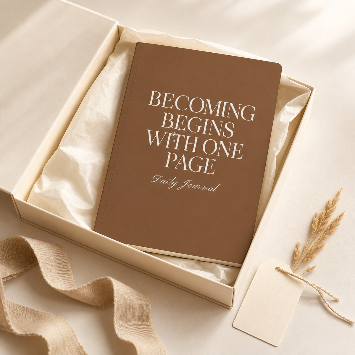 Brown Becoming Begins with One Page journal presented in a cream gift box