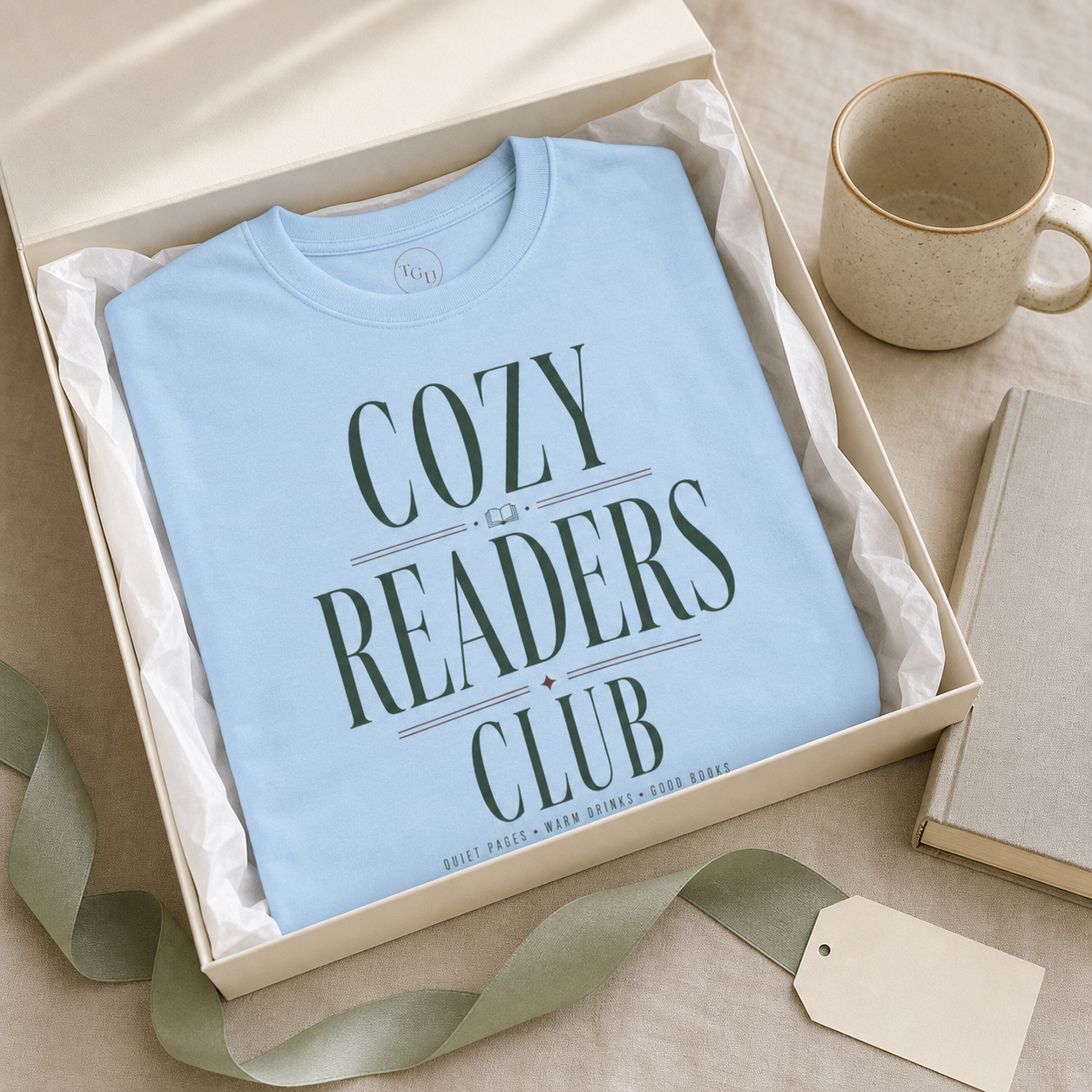 Light Blue Cozy Readers Club tee presented as a book lover gift