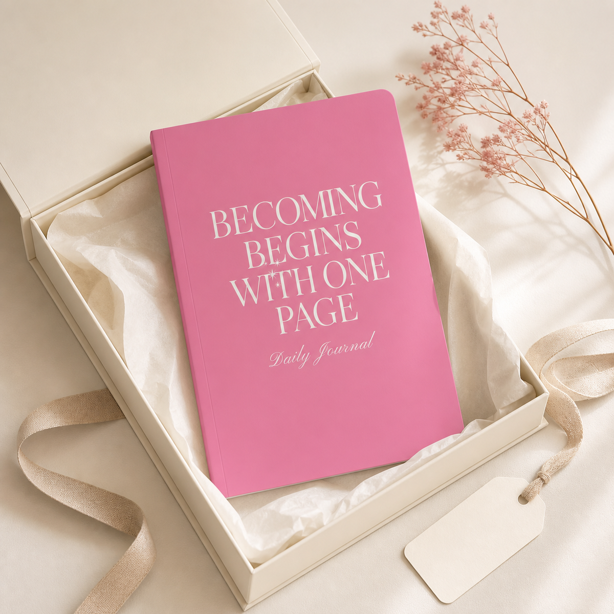 Pink Becoming Begins with One Page journal presented in a cream gift box